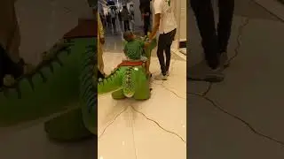 Dinosaure ride kids. kids outdoor fun time #views #cutebaby #viral #funny #sindbad #dainasour #tage