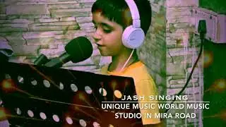 Jash singing and playing guitar in UNIQUE MUSIC WORLD STUDIO IN MIRA ROAD