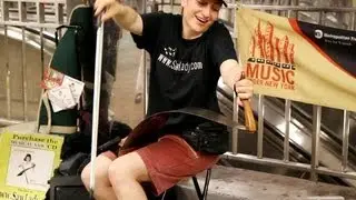 Saw Lady serenades New York City's straphangers