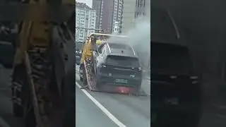 BYD EV car caught on  fire while transporting on trailer