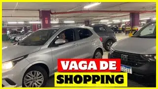 Parking in reverse in a shopping mall parking space.