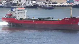 Tolmi vessel manoeuvring to depart from the Port of Piraeus, Greece