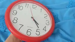Changing The Battery On My Red Plastic Wall Clock