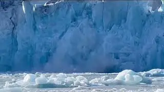 The ice wall collapsed, triggering a powerful mini-tsunami surging across the icy waters
