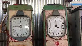 A rare clock face gasoline pump