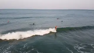 Mount Maunganui Surf with Longboard Crew doing hang ten
