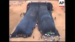 Manufacturer presents what it claims is world's largest pair of jeans