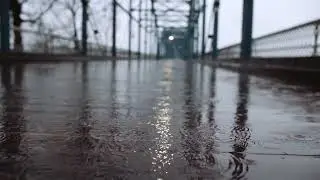 Rain Water Puddle in the Bridge