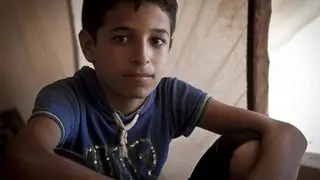 Syrian child refugee Hassan: 'The mosque was full of bodies'