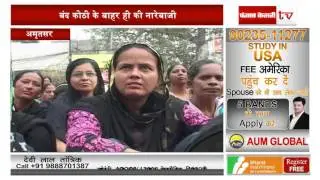Anganwadi workers hold black protest, project demands, threats to strike