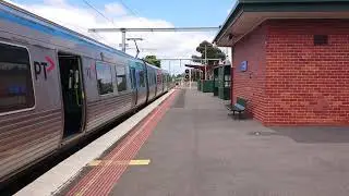V/line Vlocity DMU overtakes Metro Craigieburn service at Essendon