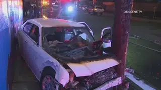 Bystanders pull driver from wrecked car in South LA