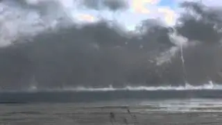 Winter waterspout offshore from Sandbanks Provincial Park / Athol Bay