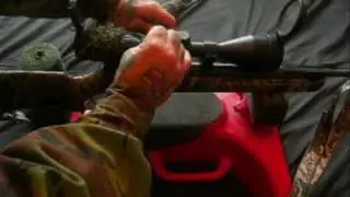 how to camouflage a  rifle scope