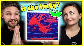 GIRLFRIEND OPENING POKEMON CARDS // hunting Vmax Charizard