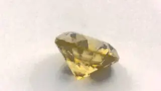 0.15 carat SI1 Good Clarity Canary Yellow Round Brilliant Solitaire Diamond