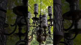 Up cycling an old chandelier using #led #solar torch lights. #upcycling #diy #outdoorlighting
