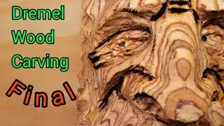 Wood carving  a Wood spirit with a Dremel flex shaft on plywood. Beard hair's & Eyes. Final