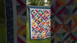 A new handmade quilt available in our shop! This bright strip quilt is made with Moongate fabrics.