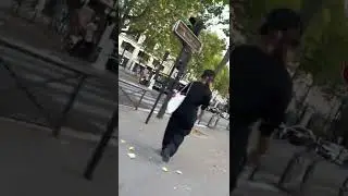 Traveling from Arch De Triomphe to the Eiffel Tower  on Lime Scooter (POV under arm)