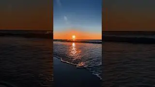 Step into serenity as I walk towards the mesmerizing orange sunrise over the tranquil waters #beach