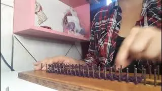 Cachecol no tear de pregos