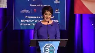 Ivonne Coll presents the award to Andrea Navedo at 2016 NHMC #ImpactAwards