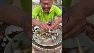 Boiled fresh water spinach with olives.
