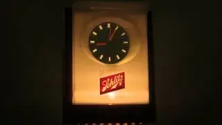 Vintage 1960's Schlitz Beer Floating Hands Light Up Clock Pub Tavern advertisting sign.
