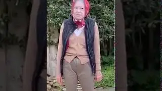 Woman Wearing Mask Gets Interrupted by Postman While Dancing