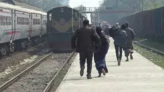 Some people stopped at the running Rocket Mail train and reached their destination- train scene