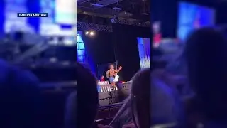 RAW VIDEO: Unidentified man takes stage at National Speech and Debate Tournament in Des Moines, c...