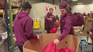 Mayo Bowl players pack food for those impacted by Helene