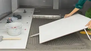 Behind the Scenes of Ceramic Tile Flooring Skilled Hands &ndash; Tile Installation Workers at Work