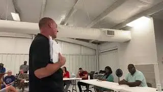 Resident David Pitts questions Police Chief Randy Patrick