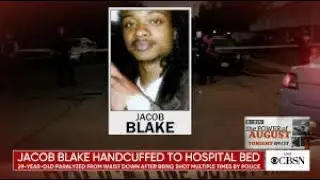 Jacob Blake recovers handcuffed in hospital as shooter Kyle Rittenhouse faces charges