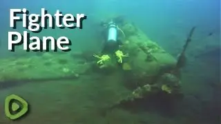Scuba diver explores mysterious WWII fighter plane wreck