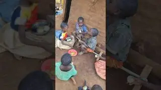 African kids eat together their lunch of peas and sweet potatoes #shortfeed #africa