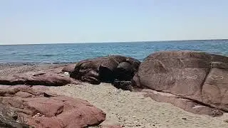 Eroded rocks and a campfire. Lake Superior 