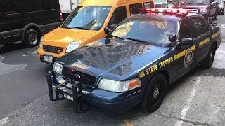 Several New York State Police Cars Responding To A Device In New York City