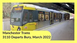 Manchester Tram 3110 departs Bury Interchange