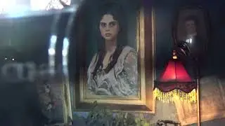 A creepy painting of a woman inside of Mortem Manor Haunted House