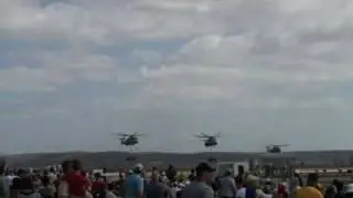 f-18 pass, 3 sikorsky stallions, and harrier