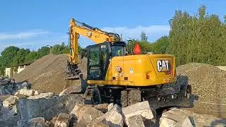 CAT M314 - pryzmowanie gruzu - I