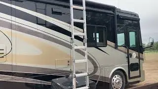 How to lift an air conditioner on to an RV in the field.