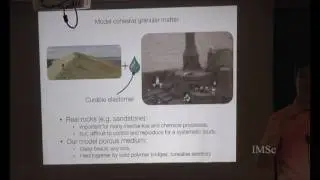 Mechanics of a model cohesive granular medium