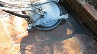 The Masters Touch Hard Surface Restoration cleaning a flagstone walkway in Jackson NJ