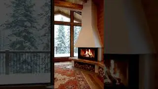 Cozy Cabin Living Room with Fireplace & Snowy Forest View