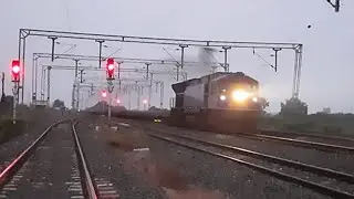 flatbed freight powered by super speedy WDG5 - Bheem 50006.