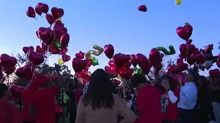 Erik Spencer's family and friends release balloons to celebrate his life